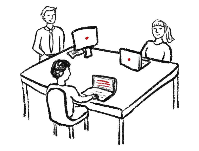 Nucleus Networks Calgary IT team collaborating around a table with laptops, delivering local managed IT support